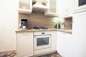 Kuchyňa alebo kuchynka v ubytovaní Art Apartments Celakovskeho Sady