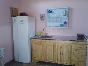 Kuchyň nebo kuchyňský kout v ubytování Alquilo departamento en Las Toninas + 8 fotografií
