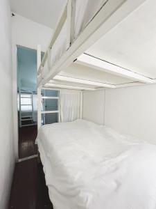 Postel nebo postele na pokoji v ubytování Rotinis Hostel + 20 fotografií