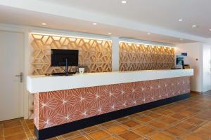 Telewizja i/lub zestaw kina domowego w obiekcie AluaSoul Menorca - Adults Only
