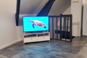 Et tv og/eller underholdning på Tulsa Home - Comme à la maison, Appartement 1 chambre