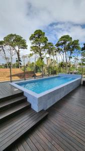 Kolam renang di atau dekat dengan SEMIPISO PINAMAR 6 PAX PILE CLIMATIZADA
