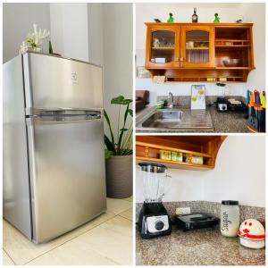 阿約拉港的住宿－Suite “Raya”，厨房配有不锈钢冰箱和台面