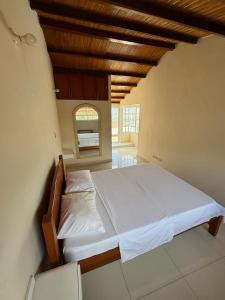 En eller flere senge i et værelse på La Casa del Conde