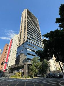a tall building on the side of a city street at Jardins São Paulo in Sao Paulo