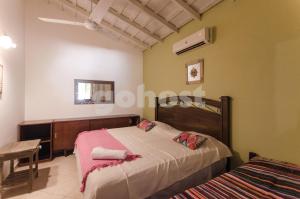 Ένα ή περισσότερα κρεβάτια σε δωμάτιο στο Comfortable And Spacious House In San Bernardino