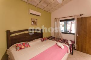 Ένα ή περισσότερα κρεβάτια σε δωμάτιο στο Comfortable And Spacious House In San Bernardino