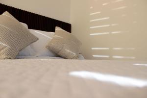 Postel nebo postele na pokoji v ubytování Hotel Zócalo Chilpancingo