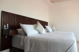 Postel nebo postele na pokoji v ubytování Hotel Zócalo Chilpancingo