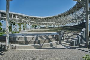 a building with stairs and a metal roof at Trion Kuala Lumpur by Cobnb in Kuala Lumpur