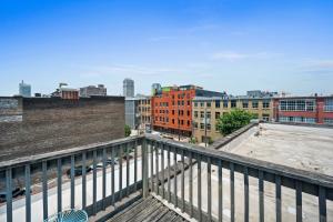 a view of a city from a balcony at Charming Boho Loft on Historic Morris Ave in Birmingham