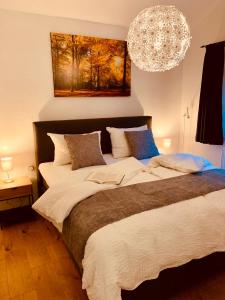 Postel nebo postele na pokoji v ubytování Casa al Bosco Ferienhaus am Wald