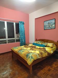 מיטה או מיטות בחדר ב-JC Sunshine Bay Resort Apartment Port Dickson