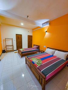 Ένα ή περισσότερα κρεβάτια σε δωμάτιο στο Yoma Wild Hotel +37 φωτογραφίες
