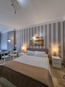 Postel nebo postele na pokoji v ubytování B&B Pescara Centro Luxury Suite + 37 fotografií