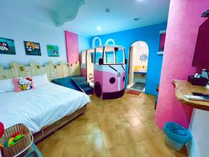 Postel nebo postele na pokoji v ubytování Kenting Bayview Hotel