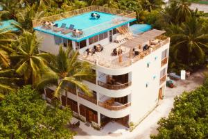 an aerial view of a hotel with a swimming pool at Manta Sea View Himandhoo in Himandhoo 