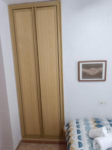 Posteľ alebo postele v izbe v ubytovaní Apartamento Velázquez