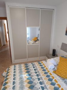 Posteľ alebo postele v izbe v ubytovaní Apartamento Velázquez