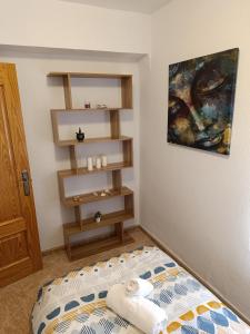 Posteľ alebo postele v izbe v ubytovaní Apartamento Velázquez