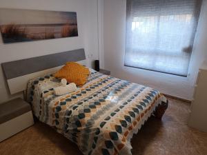 Posteľ alebo postele v izbe v ubytovaní Apartamento Velázquez
