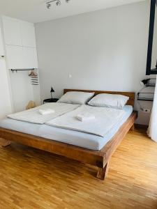 Postelja oz. postelje v sobi nastanitve HAY Apartment Bled