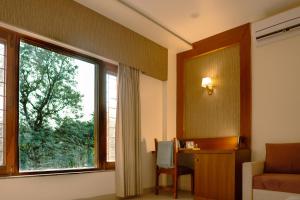 Posezení v ubytování Hotel Ananda Kashi