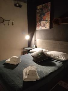 Säng eller sängar i ett rum på Urban Suite