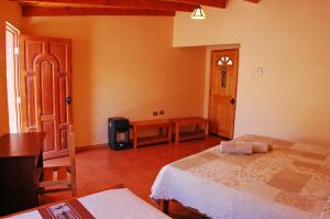 Postel nebo postele na pokoji v ubytování Quechua Hotel