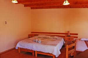 Postel nebo postele na pokoji v ubytování Quechua Hotel