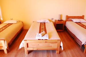 Postel nebo postele na pokoji v ubytování Quechua Hotel