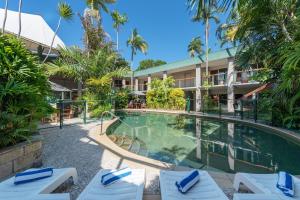 an image of the pool at the resort at Bay Village Tropical Retreat & Apartments in Cairns