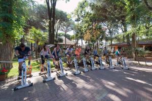 a group of people on bikes in a park at Mobilehomes in Lido di Spina 21308 in Lido di Spina