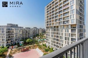 an aerial view of a large apartment building at Mira Holiday Homes - Lovely 1 bedroom in Midtown in Dubai