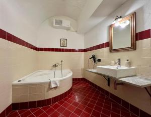 Kúpeľňa v ubytovaní Le Serre Suites & Apartments