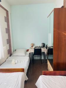 Postel nebo postele na pokoji v ubytování Villa Jakos Paradise