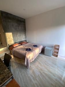 Postel nebo postele na pokoji v ubytování Phang Nga Viewpoint