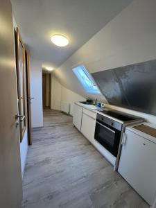 Kuchyň nebo kuchyňský kout v ubytování Gasthaus Katrin