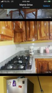 a kitchen with a stove top and a microwave at Tropical Gavilla 