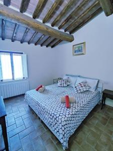 a bedroom with a large bed in a room at Gest Short Rent Siena 2 in Siena