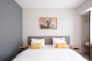 Postel nebo postele na pokoji v ubytování S101 Hotels