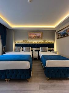 Postel nebo postele na pokoji v ubytování Constantinopolis Hotel