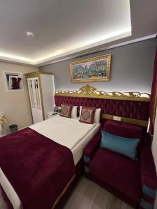 Postel nebo postele na pokoji v ubytování Constantinopolis Hotel