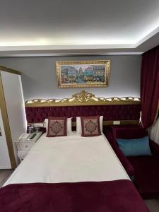 Postel nebo postele na pokoji v ubytování Constantinopolis Hotel