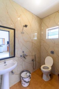 Ένα μπάνιο στο De Alara Calangute