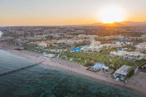 an aerial view of a beach at sunset at Rixos Sharm El Sheikh - Ultra All Inclusive Adults Only 18 Plus in Sharm El Sheikh
