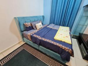 Lova arba lovos apgyvendinimo įstaigoje Homestay Epoh Meru Raya F3A with Netflix
