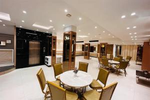 Posezení v ubytování Qotel Hotel AT Residency Kaushambi Anand Vihar