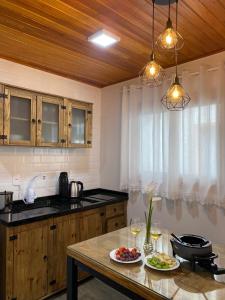 Kuchyň nebo kuchyňský kout v ubytování Hospedagem Casa Lorenzi 3