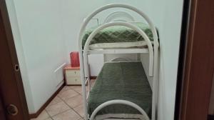 Postel nebo postele na pokoji v ubytování Le Chic 2 Vanzago